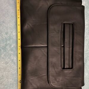 Elegant Black Women’s Clutch Bag
Faux leather